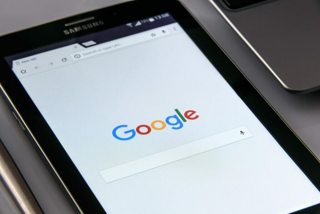 photo of a black tablet with a google search window open